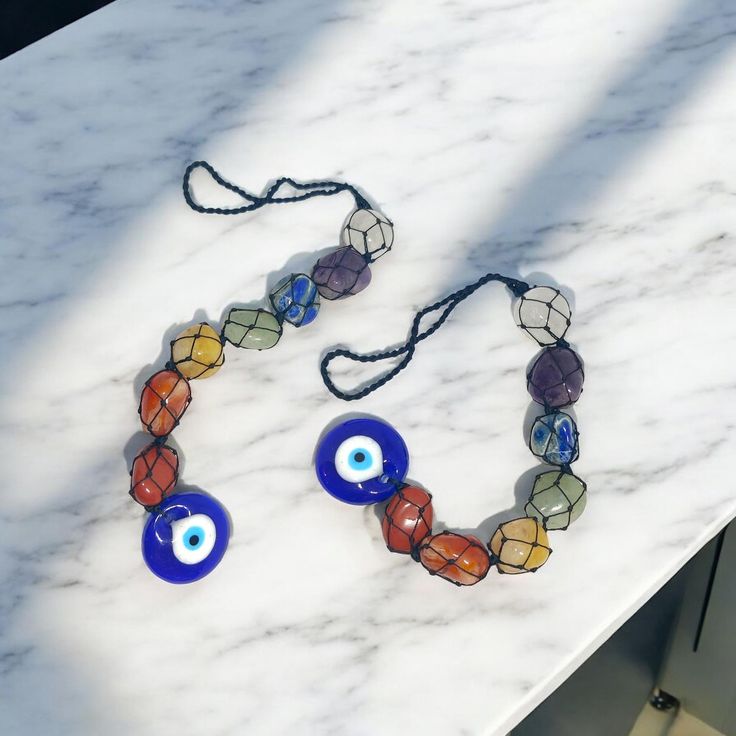 Evil eye with 7 chakra raw stone