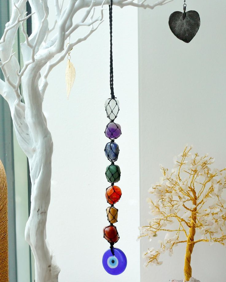 Evil eye with 7 chakra raw stone